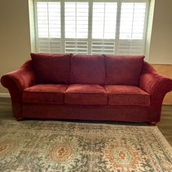 Terracotta red sofa couch