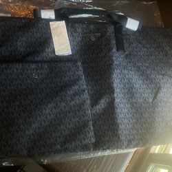 black Michael Kors travel set 