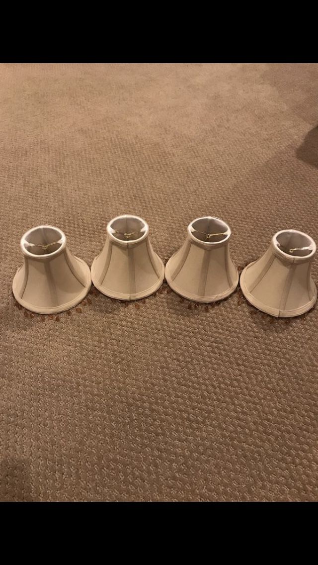 4 cream colored mini chandelier shades
