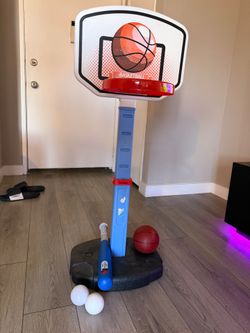 Kids basketball stand with baseball bat