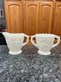 Vintage Westmoreland Milk Glass Maple Leaf Creamer and Sugar Bowl Set.  Size approximately 4 inches tall.  Preowned.  Has been on display in a cabinet