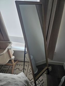 Tall standing mirror