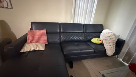 Navy blue leather couch