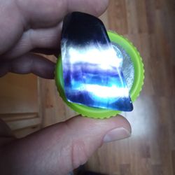 Beautiful Dark Rainbow Fluorite I Put A Dim Flashlight Underneath It So You Could See The Colors