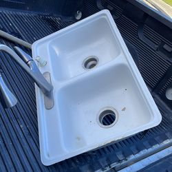 Used sink with working faucet