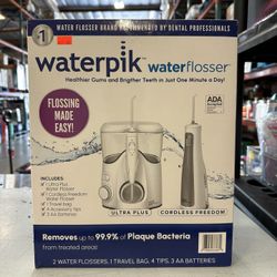 Waterpik Water Flosser Ultra Plus & Cordless Freedom Brand New In Box 