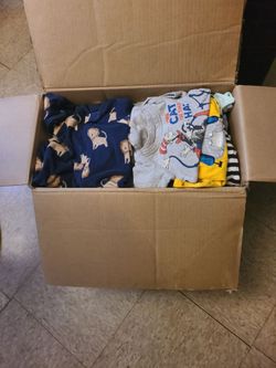 Box of boys newborn clothes