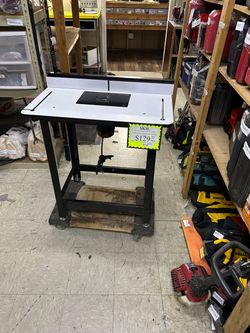 10035 Skil Brushless Router on Table *missing one foot on table*  97027