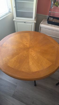 Round Wood Dining Table with Starburst Inlay