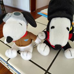 2 Snoopy Stuffed Animals 