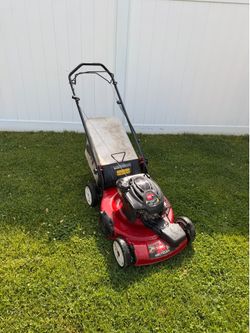 Self propelled lawn mower