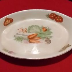 French Sico Toulaine oval casserole dish mid century vintage with garden vegetables and gold rimmed

