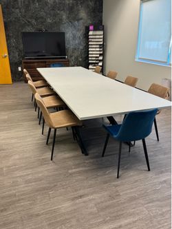 Custom fabricated steel and quartz conference/dinner table