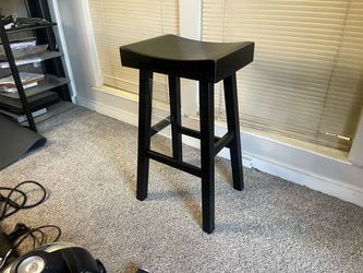 Brand new Ashley black contoured stool