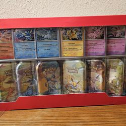 8 Prismatic evolutions mini tins