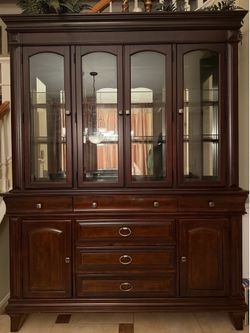 Exquisitely Designed Hutch Cherry Wood Glass shelves with lights from Mor Furniture