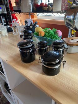 Small black canister