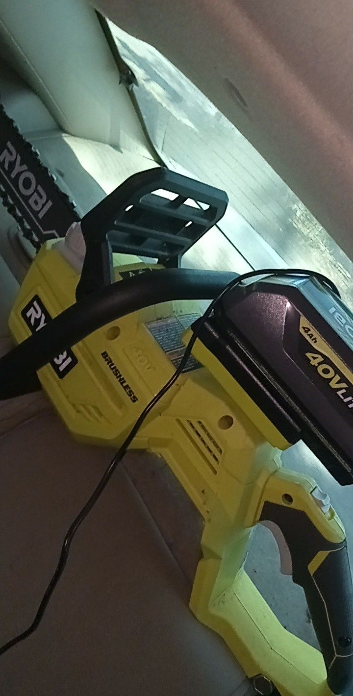 Ryobi Brushless Battery Powered Chainsaw. With 40v Lithium Battery And Charger.