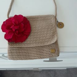NEVER USED, THE SAK SMALL CROSSBODY IN EXCELLENT CONDITION 