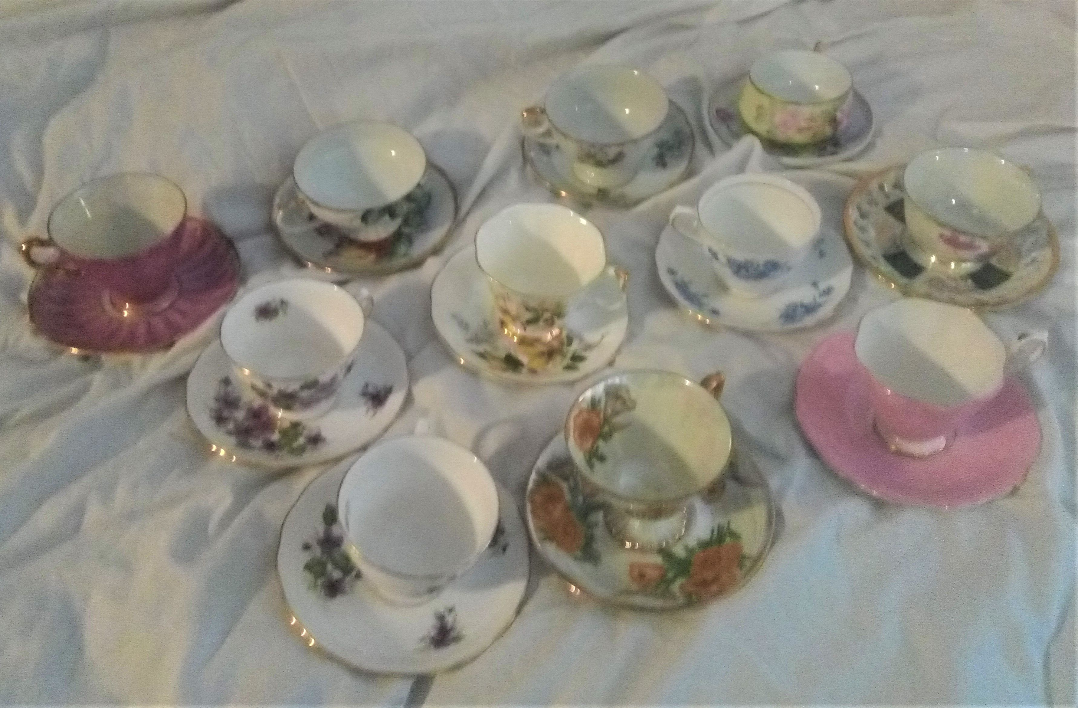 11 SETS OF TEA CUPS AND SAUCERS
