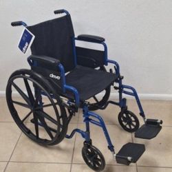 Wheelchair with Swing-Away Footrests and Flip-Back. Arms