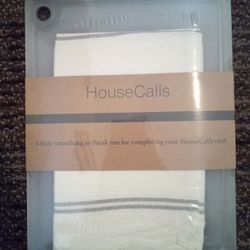 CUTTING BOARD. BRAND NEW. STILL IN PLASTIC WRAP.