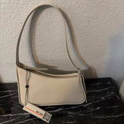 We-ar4 beige leather purse NWT