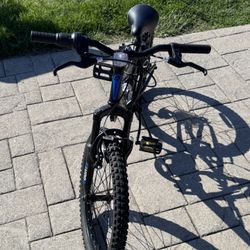 20-inch kids mountain bike (Huffy/Hyper-style with rear suspension)
