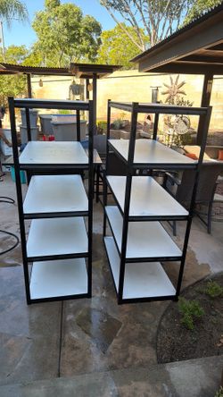 Two storage racks $200