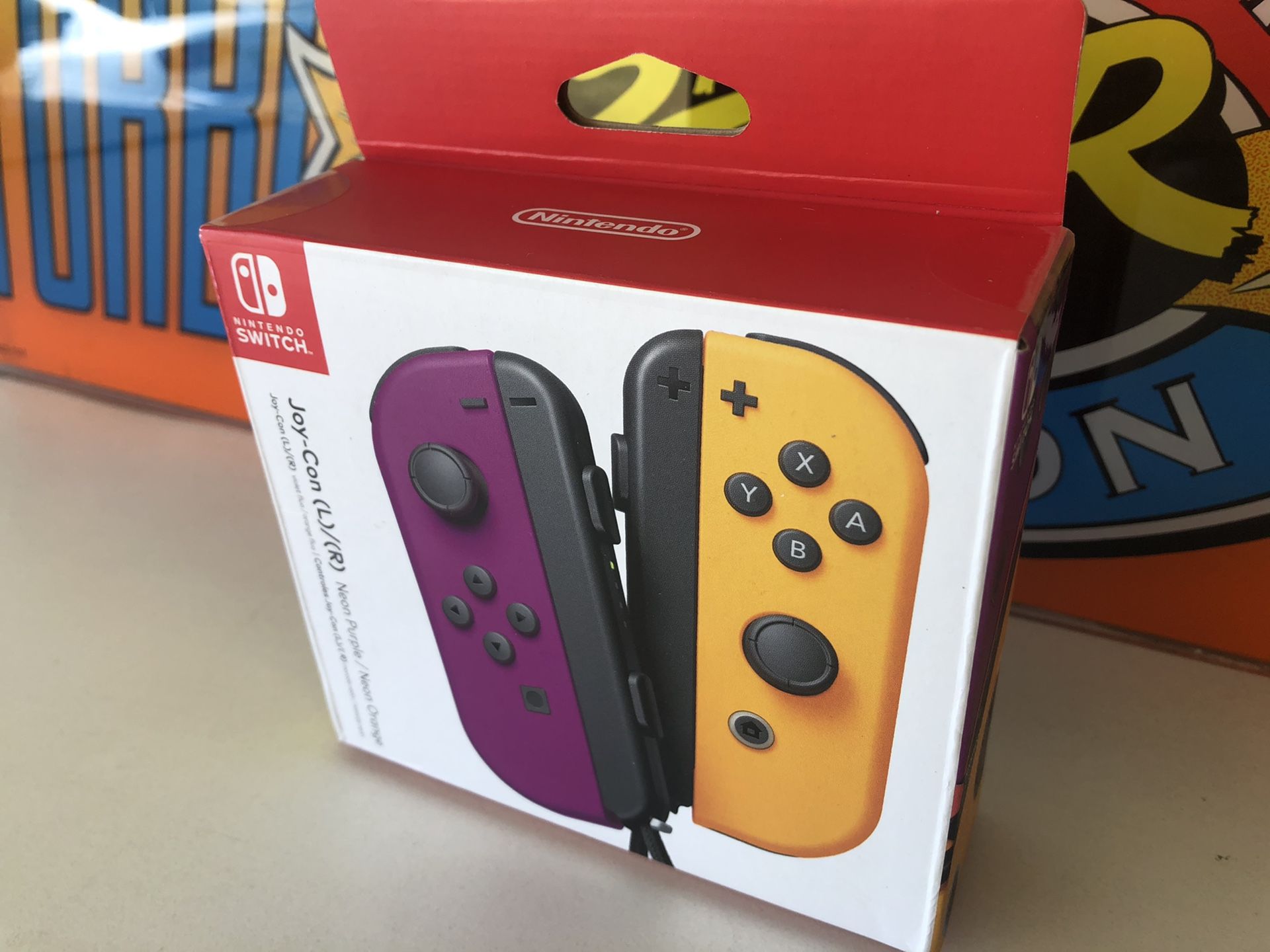 Nintendo Switch Neon Orange & Purple Joycons NEW