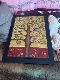 Tree of life in a heavyweight wooden panel.