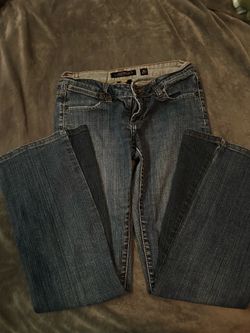 Ed Hardy low rise flare jeans with embroidered tiger design on back pockets, size 26