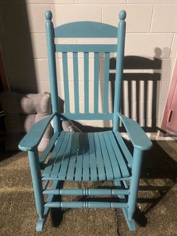 Teal wooden rocking chair