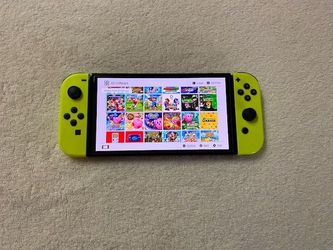 Nintendo Switch OLED + 100 SWITCH Games