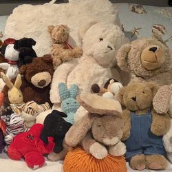 Assortment Of Large And Small Stuffed Animals
