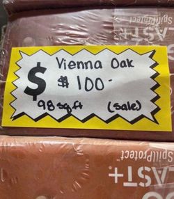 SALE - Vienna Oak 12 mm Tx 7.5 in. W Waterproof Laminate Wood Flooring