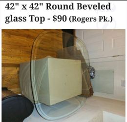 Big beveled glass table top. Thick.