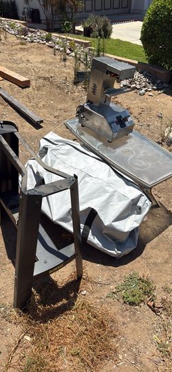 Free pile, dewalt stand, table, packaging machine, a boat tow behind that needs to be glued