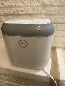 Coral UV Sterilizer and Dryer countertop sanitizer uses UV-C light to kill bacteria