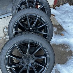 225/45/17 Blizzak Tires Mounted on 5x124.3 Liquid Metal Blackout Rims 
