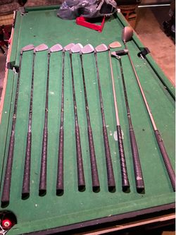 Various golf clubs