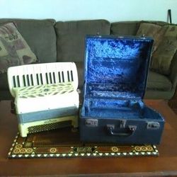 Mother of Pearl Wurlitzer Vintage accordian in original case