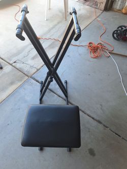 Double legged stand with seat
