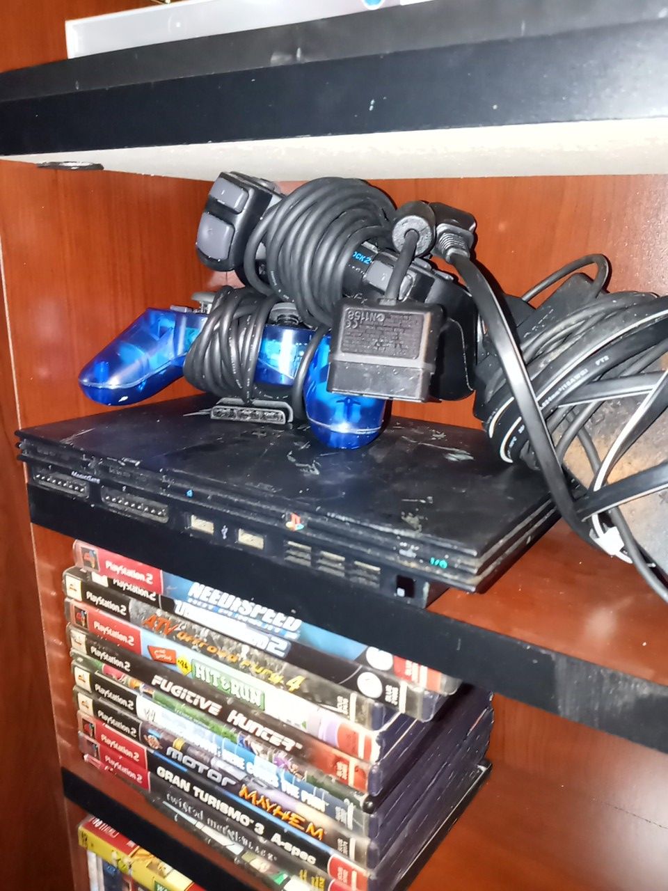 Playstation 2 with 2 controllers and 12 games