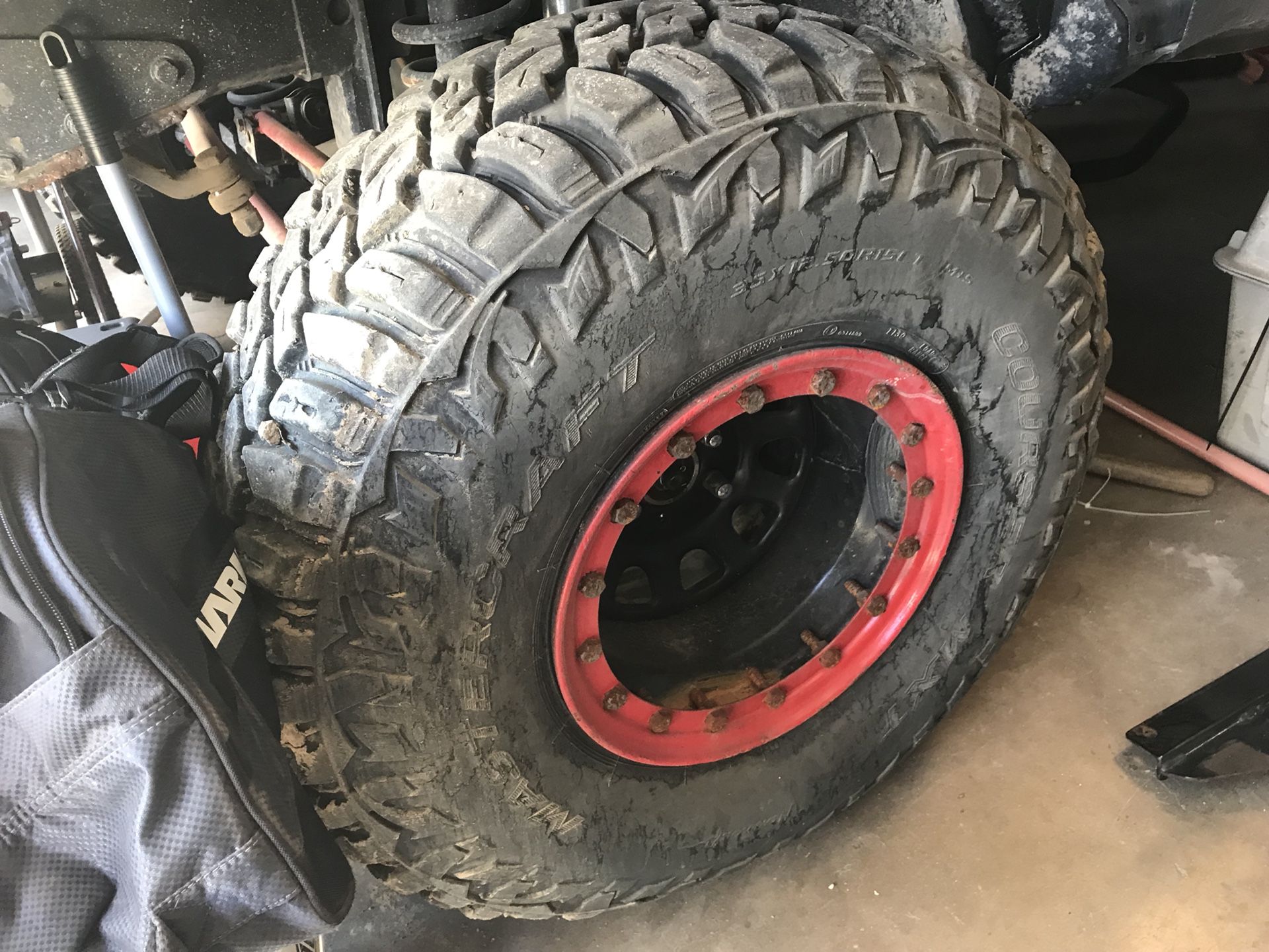 4 35/12.5./15 Mastercraft M/T tires with fake beadlocks the rims are off a Jeep in going to part