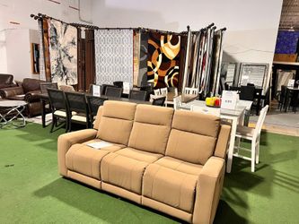 Brand New Reclining Sofa. 