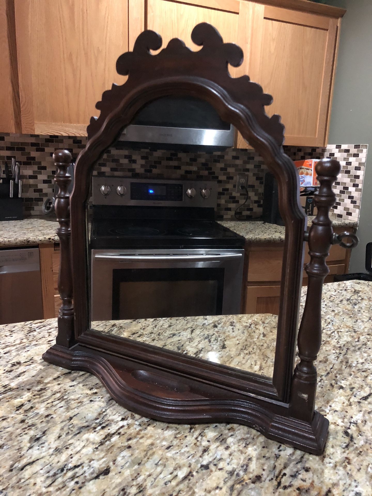 Small vintage swinging mirror