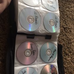 Case And A Whole Bunch Of Assorted DVDs 