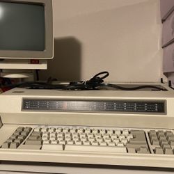 IBMV intage IBM electric typewriter with a computer screen