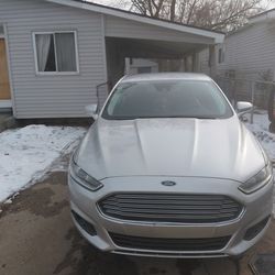 2016 Ford Fusion leather heated 1.5 turbo 4 cylinder good on gas good point A to point B car 3750 or best